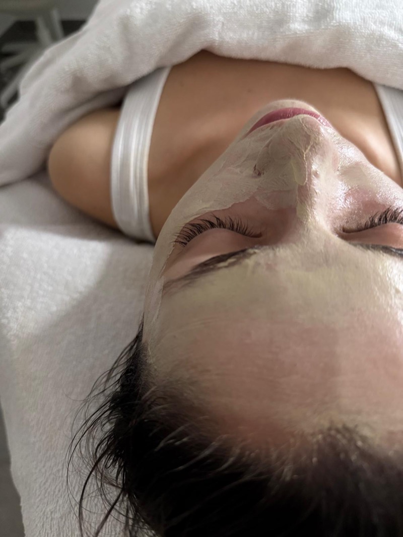 Professional facial mask closeup application